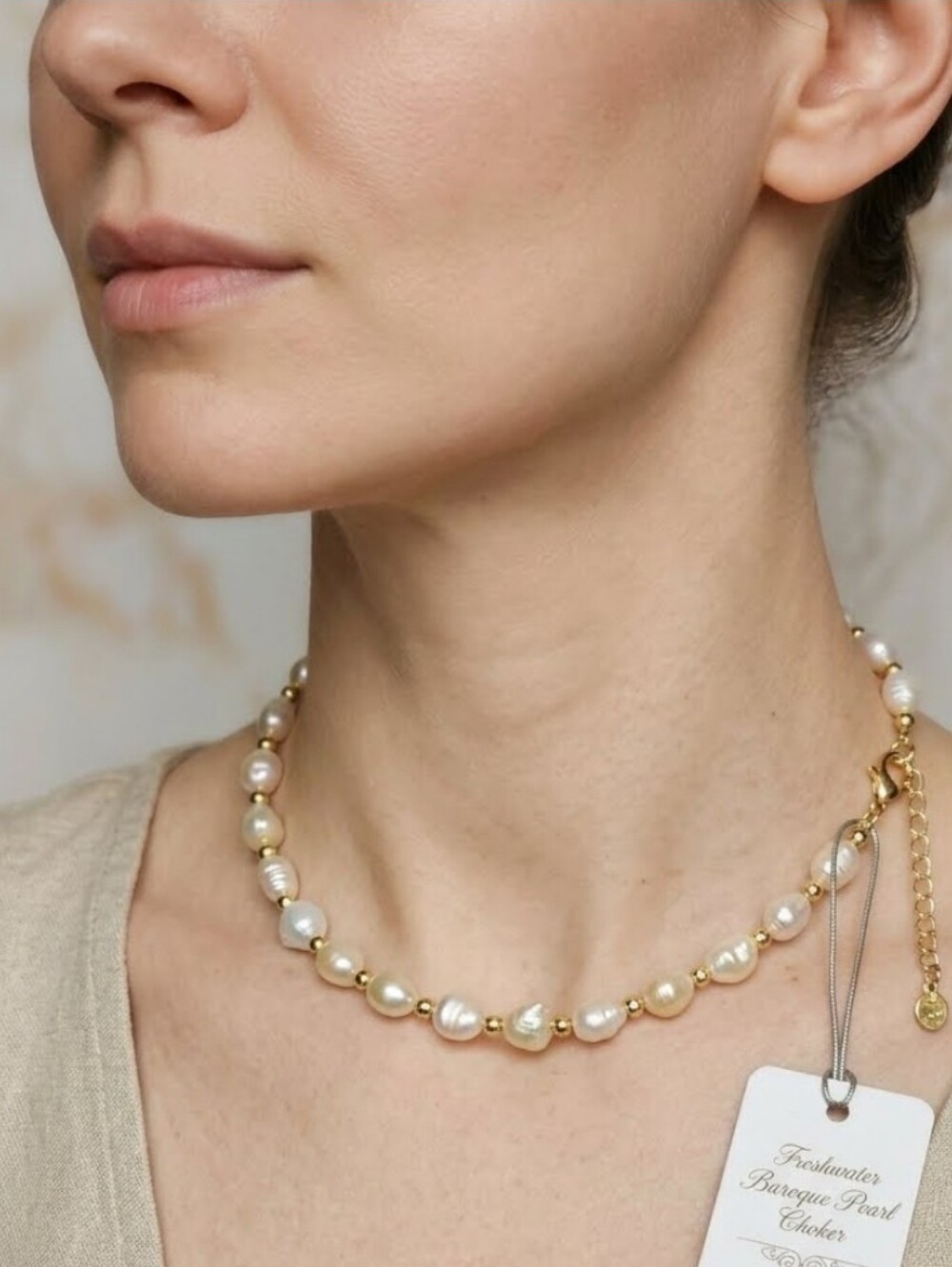 freshwater baroque pearl choker necklace interspersed with tiny gold spacer bead
